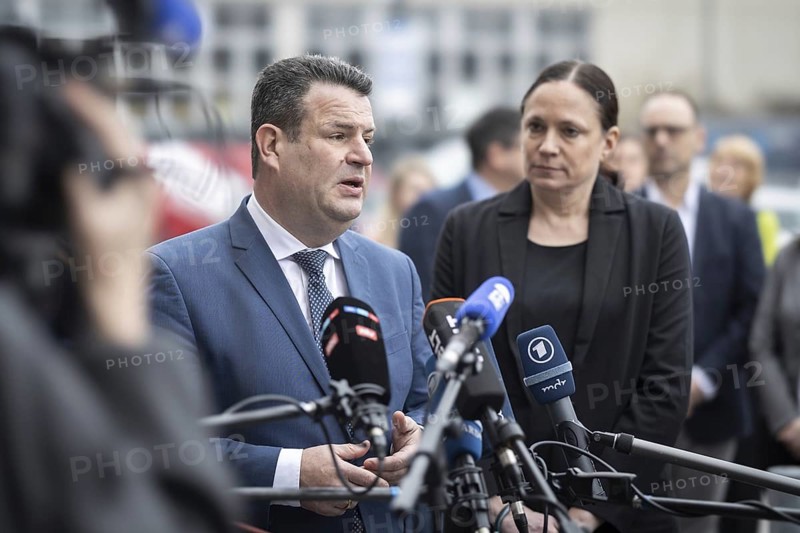 Hubertus Heil (SPD), Federal Minister of Labour and Social Affairs, and Dr Daniela Büchel, Head of Human Resources at REWE Group, answer questions from the press after a meeting with Ukrainian refugees employed in various areas of REWE Group. Berlin, 27 February 2024