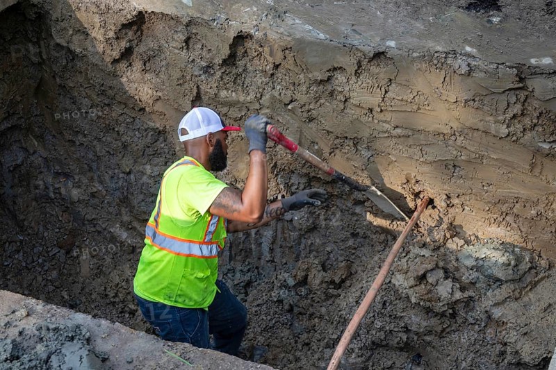 Detroit, Michigan, Workers replace old lead water service lines with copper pipes. Lead is harmful to health, especially in children. The city of Detroit estimates there are 80, 000 homes in the city with lead service lines and has begun a program to replace them all