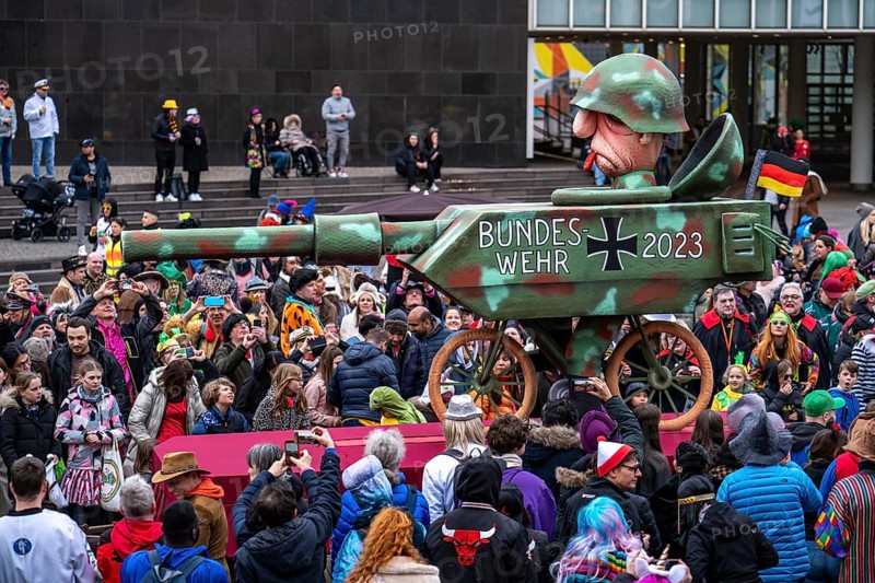 Rose Monday parade in Düsseldorf, street carnival, motif float in carnival, by float builder Jacques Tilly, theme: criticism of the state of the German armed forces