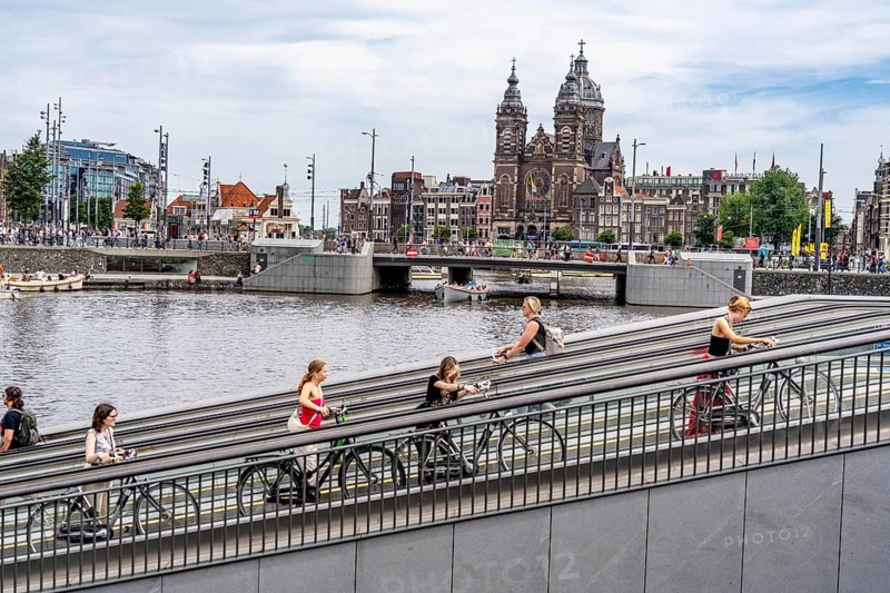New bicycle car park at Amsterdam Central Station, Stationsplein, space for around 7000 bicycles, largest in Amsterdam, digitally monitored, underground, direct connection to the station and metro, Netherlands, escalators lead to the bicycle garage, Netherlands