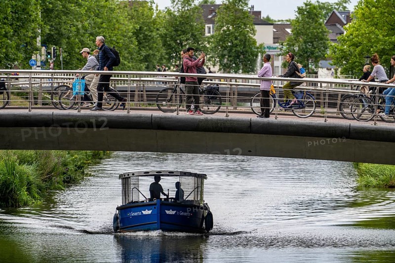 Central cycle path on the Vredenburg Viaduct, at the Hoog Catharijne shopping centre, in the city centre of Utrecht, heavy traffic, canal, boat, Netherlands