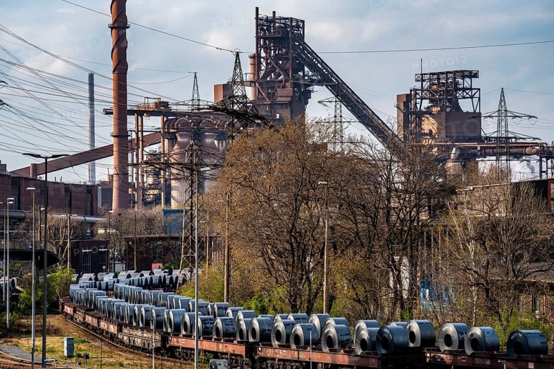 Blast furnace Schwelgern 1 and 2, strip steel rolls, coils, on freight wagons, at the ThyssenKrupp Schwelgern plant in Duisburg-Marxloh, part of the Bruckhausen steelworks, North Rhine-Westphalia, Germany, Europe