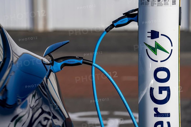 Electric car fast charging station, from the Dutch provider PowerGo, in the ferry harbour of Eemshaven, powered by renewable energy, Netherlands