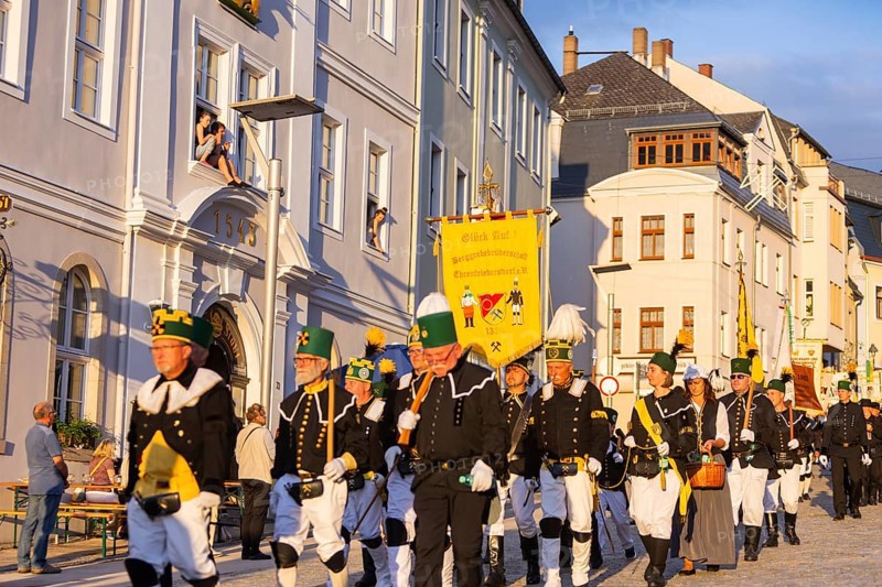 The so-called Bergstreittag is a beautiful centuries-old tradition and is celebrated on 22 July, the church memorial day and former feast day of Mary Magdalene in Schneeberg. The four quarterly sermons introduced in 1649 remained in place until 1845. These sermons were then abolished in favour of a single day, 22 July, which fell on Mary Magdalene. The Freiberg Mining Office recommended that this day should be celebrated with a festival and a mountain parade. In 1846, the Royal Ministry of Finance issued a decree to celebrate St Mary Magdalene's Day with a sermon and a magnificent mountain procession. The last major procession took place in July 1913. The First World War put an end to these processions. The tradition was not revived until July 1933, 528th Bergstreittag, mountain parade, Schneeberg, Saxony, Germany, Europe