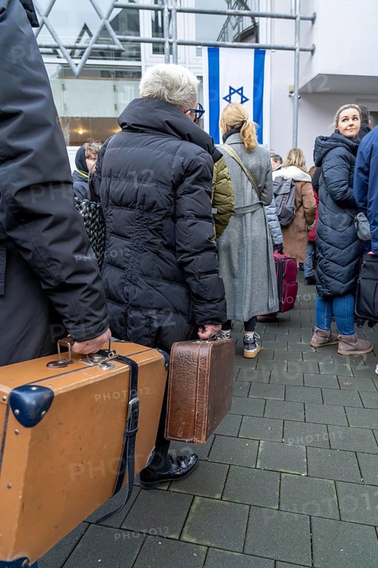 Suitcase march in Recklinghausen, for the 2nd time over 500 people walk through Recklinghausen, carrying suitcases with the inscription #WeRemember, in memory of the deportation of 216 Jews in the Nazi era in RE, on the day in front of the International Holocaust Remembrance Day, to the synagogue, followed by a memorial service, the names of the deported people are written on the pillars, North Rhine-Westphalia, Germany, Europe