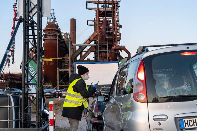 Drive-in cinema Dortmund, in front of the backdrop of the former blast furnace plant Phönix-West in Dortmund-Hörde, temporary film screening, event in compliance with contact restrictions, contactless checking of admission tickets, only bookable online, effects of the corona crisis in Germany