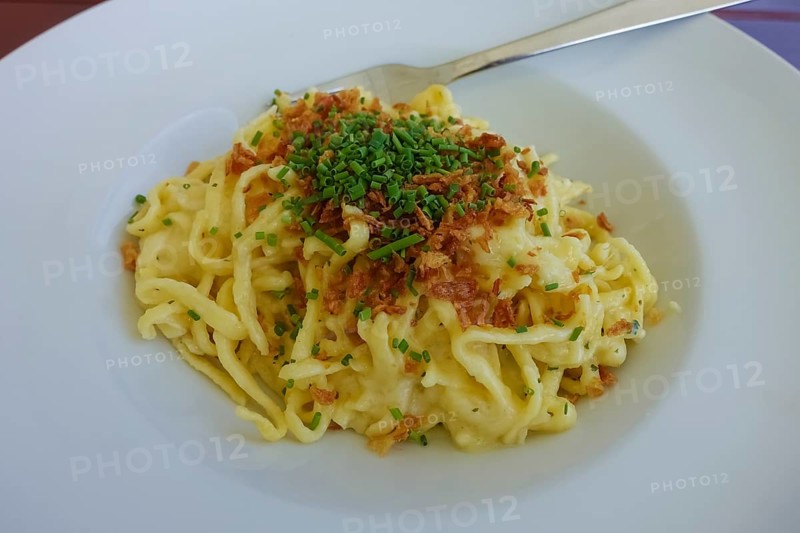 Swabian cuisine, traditional cuisine, home cooking, typical Swabian, hearty, Kässpätzle with braised onion, chives, Königliche Post restaurant, restaurant, food photography, old camp, former military area, biosphere area, Münsingen, Swabian Alb, Baden-Württemberg, Germany, Europe