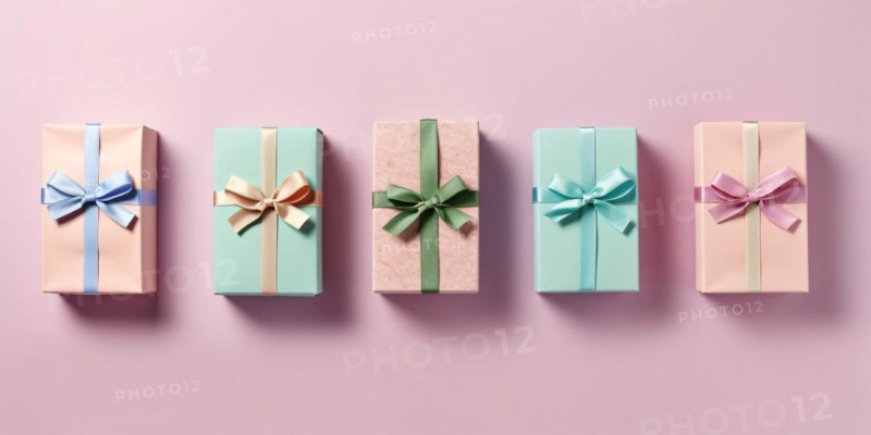 Top view of many small pastel colored gift boxes in a row on pink background. KI generiert, generiert AI generated
