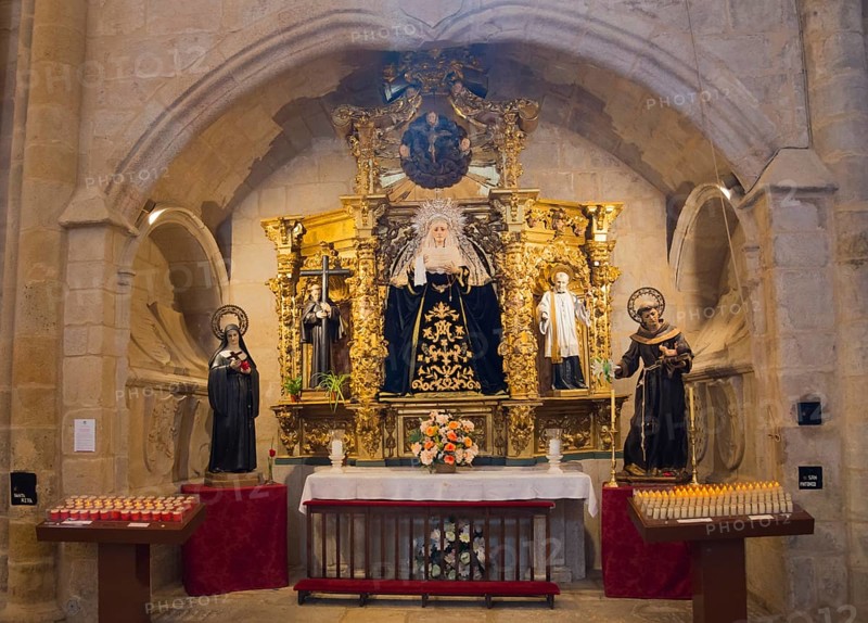 Altar with holy statues, candles and flowers, Cathedral, Concathedral, Iglesia de Santa Maria, Old Town, Co-Cathedral Santa María de Cáceres, Cáceres, Caceres, Extremadura, Spain, Europe