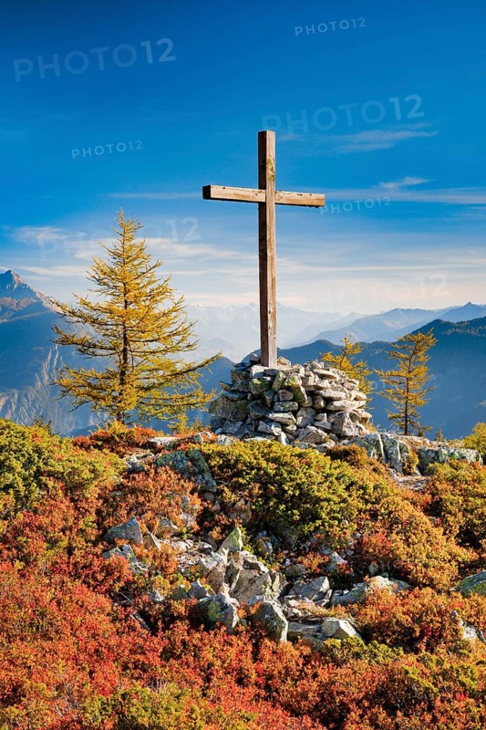 View of the Valais mountains and the Rhone valley with summit cross in autumn, Lower Valais, Switzerland, Europe