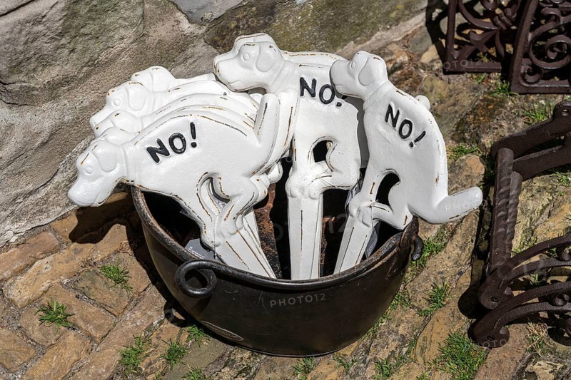 Shop sells small signs for the front garden to prevent dog owners from taking their dogs into the garden, no walking