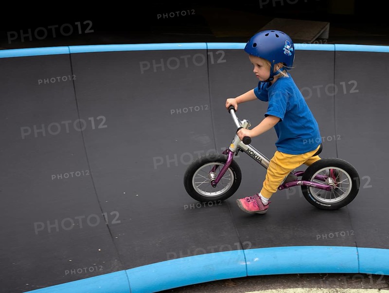 Little girl, 3 years, blonde, helmet, helmet, riding on balance bike, bicycle, skating rink, playground, Stuttgart, Baden-Württemberg, Germany, Europe