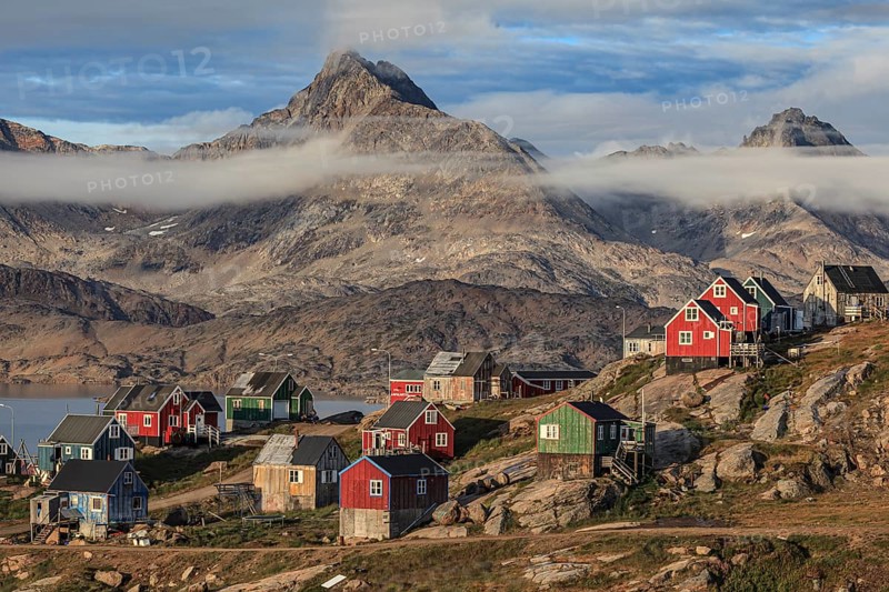 Inuit settlement at a fjord with icebergs, mountainous, autumn, sunny, Tasiilaq, East Greenland, Greenland, North America