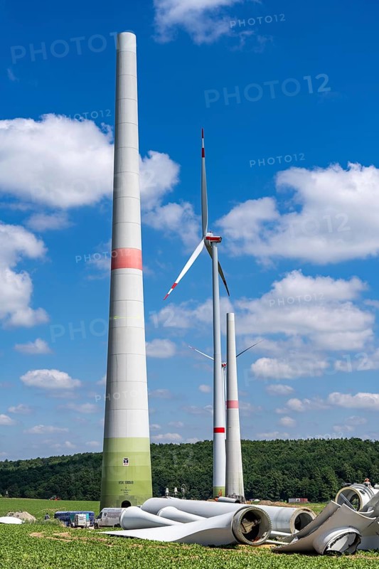 Repowering of a wind farm, near Brilon-Radlinghausen, 2 old turbines are demolished, rotors and dome are already on the ground and 4 new wind turbines are erected, each with a hub height of 160 metres, each with an output of 4.2 MW, North Rhine-Westphalia, Germany, Europe