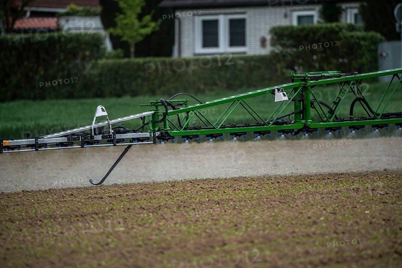 Agriculture, pesticide being sprayed on a field, sugar beet seedlings, North Rhine-Westphalia, Germany, Europe