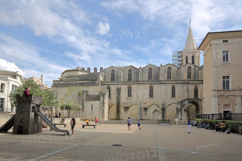 Romanesque church of St-Siffrein and children's playground, Saint, Carpentras, Vaucluse, Provence, France, Europe