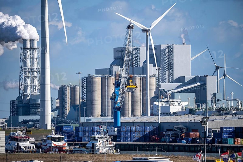RWE coal-fired power plant Eemshavencentrale, in the seaport of Eemshaven, operator RWE Power, wind farm, Netherlands