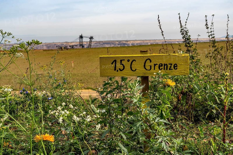 So-called 1.5°C border on the edge of the lignite mining area at the Garzweiler II open-cast mine, the village of Lützerath is to be dredged away, all buildings except for a farm have been demolished, resistance camp of activists from Lützerath lives, resistance against demolition, Erkelenz, North Rhine-Westphalia, Germany, Europe