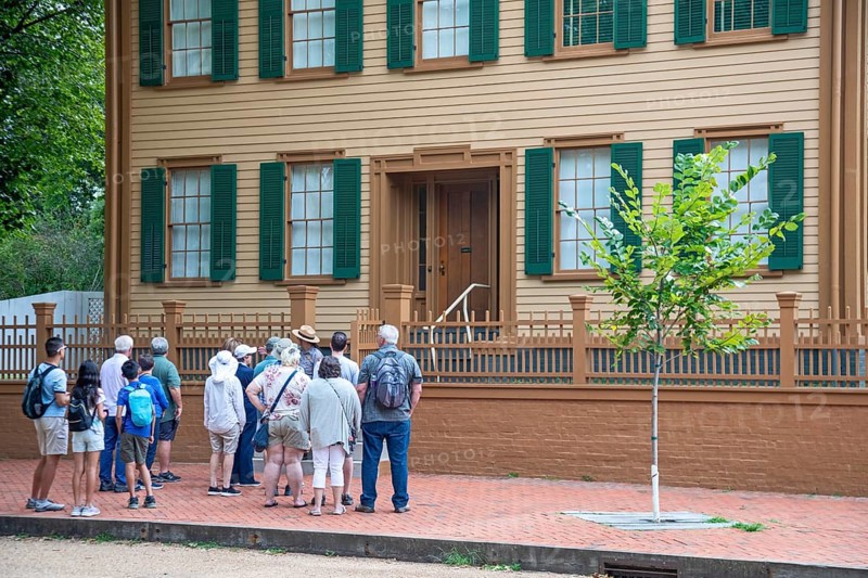 Springfield, Illinois, The Lincoln Home National Historic Site preserves the home and neighborhood where Abraham Lincoln lived before he became the 16th president of the United States. A park ranger talks to tourists in front of Lincoln's home