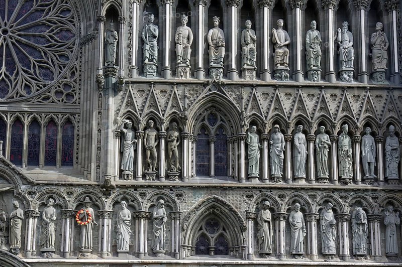 Gothic cathedral with stone statues and religious figures on the façade, Nidaros Cathedral, old city centre, Nidarelva, Trondheim, Norway, Europe