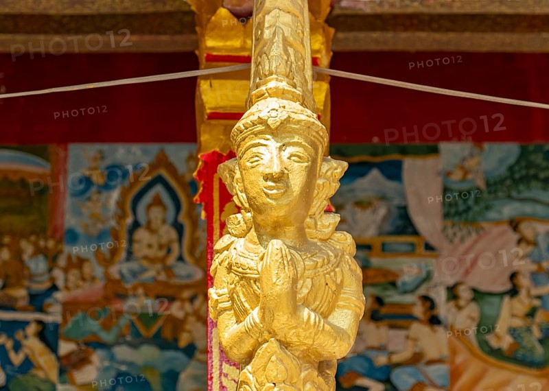 Gilded deity statue, Wat Phonxay, Luang Prabang, Laos, Asia