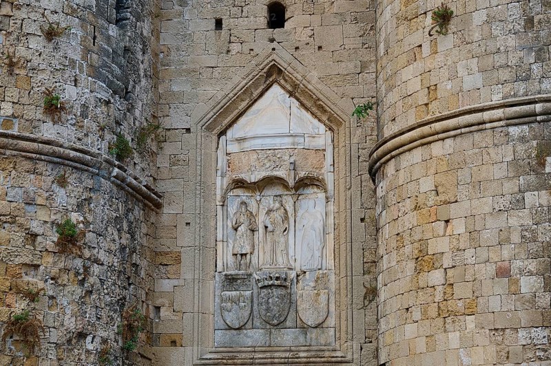 City wall, Thalassini Tor, detailed view of a medieval fortress with stone reliefs and sculptures between massive stone walls, Rhodes Old Town, Rhodes Town, Rhodes, Dodecanese, Greek Islands, Greece, Europe