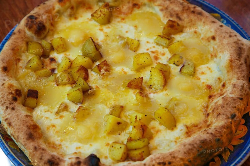 Italian cuisine, Mediterranean cuisine, pizza with potatoes and cheese, Taleggio, baked, from the oven, yeast yeast dough, savoury, vegetarian, food photography, studio, Germany, Europe