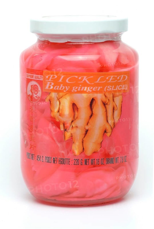 Sweet and sour pickled ginger from Korea, ginger slices in a jar