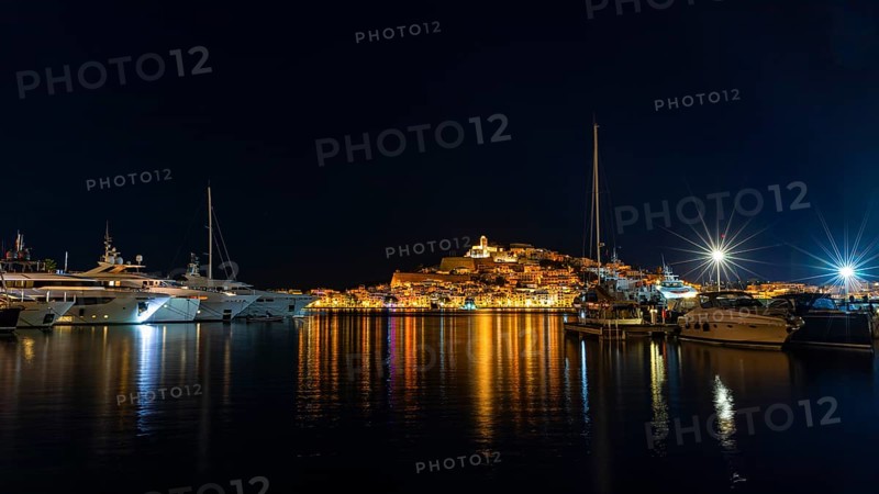 Luxury yachts anchoring in the harbour, behind the illuminated fortress and the old town, night shot, Eivissa, Ibiza Town, Ibiza, Balearic Islands, Mediterranean Sea, Spain, Europe