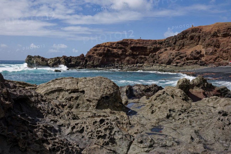 Lava rocks at the Playa de los Ciclos near the Green Lake, Lago Verde, El Golfo, Lanzarote, Canary Islands, Canary Islands, Spain, Europe