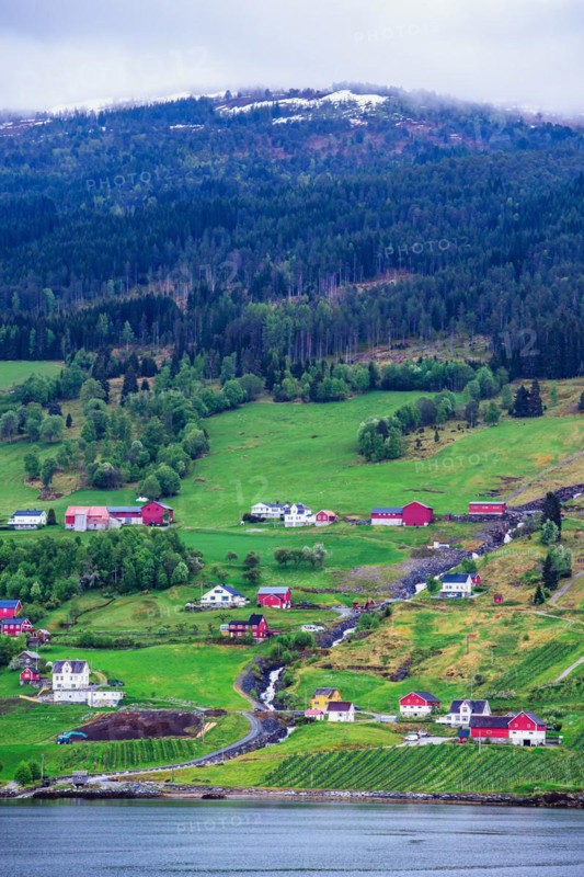 Mountains and Fiord over Norwegian Village in Olden, Innvikfjorden, Norway, Europe