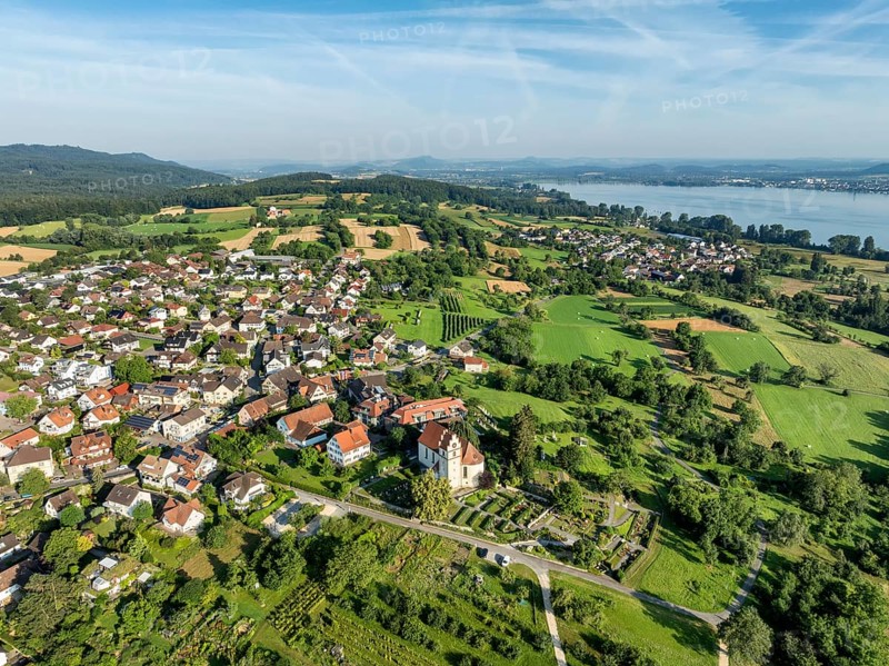 The church of St Johann and Vitus in Horn on the Höri peninsula, on the horizon the Hegau mountains and the town of Radolfzell on Lake Constance, aerial view, Gaienhofen, district of Constance, Baden-Württemberg, Germany, Europe
