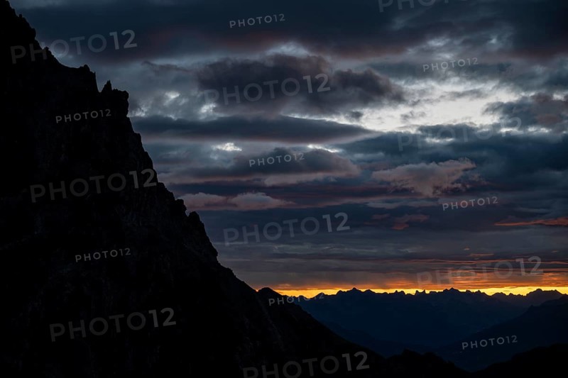 Montafon mountains with dramatic cloudy sky at sunrise, Tschagguns, Rätikon, Montafon, Vorarlberg, Austria, Europe