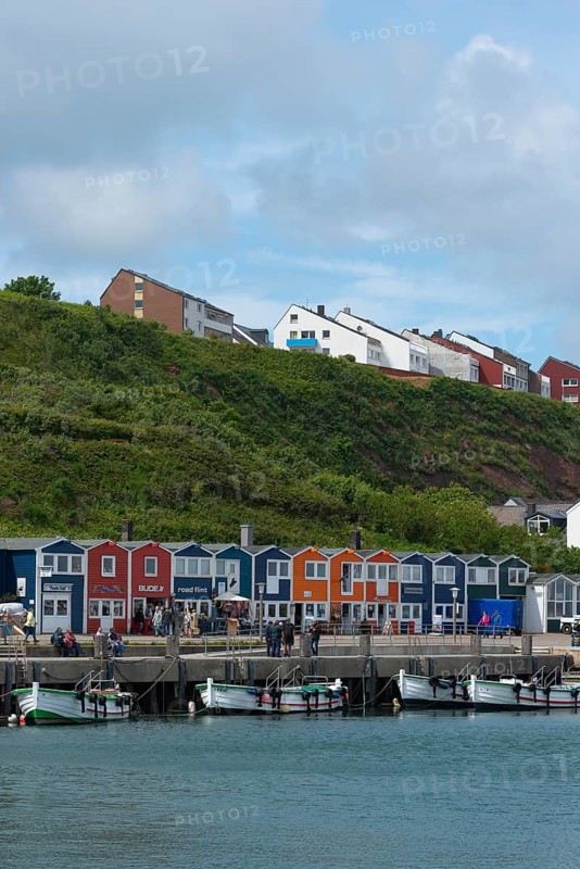 Colourful lobster shacks on the promenade in the lowlands, boats, offshore island of Heligoland, cliff coast, guesthouses in the uplands, North Sea, Pinneberg district, Schleswig-Holstein, Germany, Europe