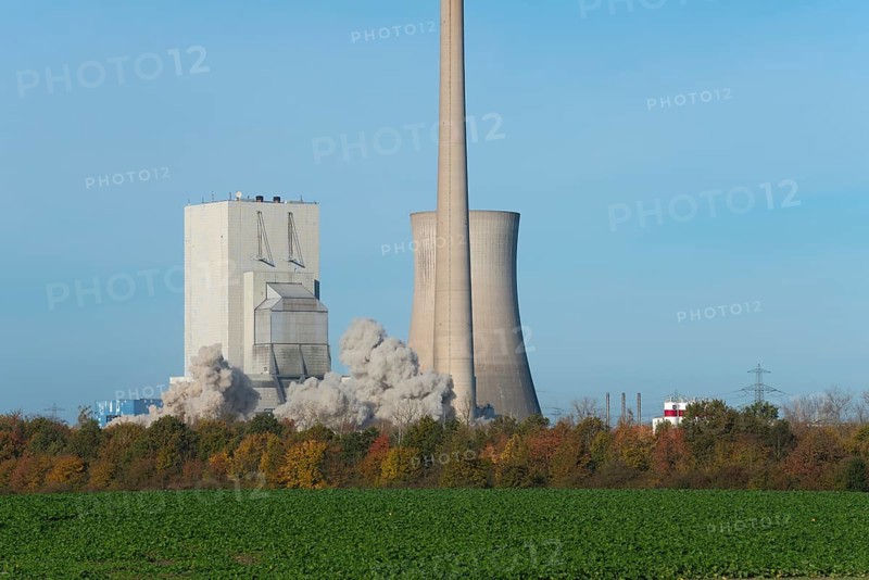 Industrial plant with swirling dust cloud, surrounded by autumnal landscape, blasting of the ash silos, Mehrum coal-fired power plant, Peine district, Lower Saxony, Germany, Europe