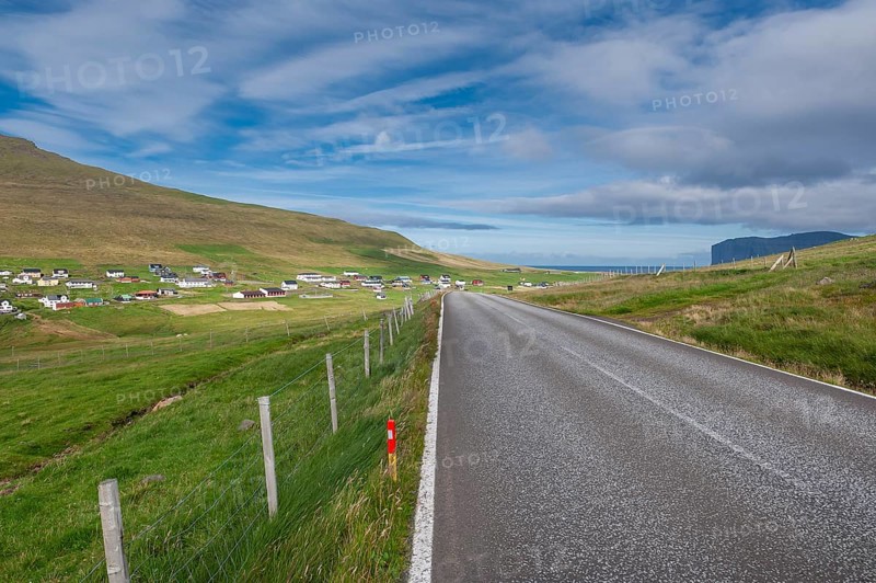 Rural road overlooking the village of Vidareidi, Vidoy Island, Viðareiði, Viðoy Island, Faroe Islands, Denmark, Europe