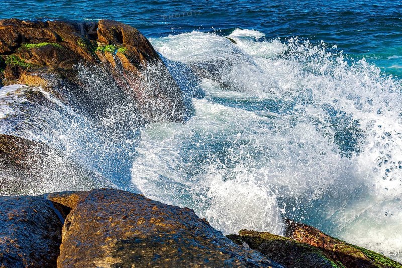 Sea water splashing and foam after wave crashes against the rock, Ipanema Beach, Rio de Janeiro, Rio de Janeiro, Brazil, South America