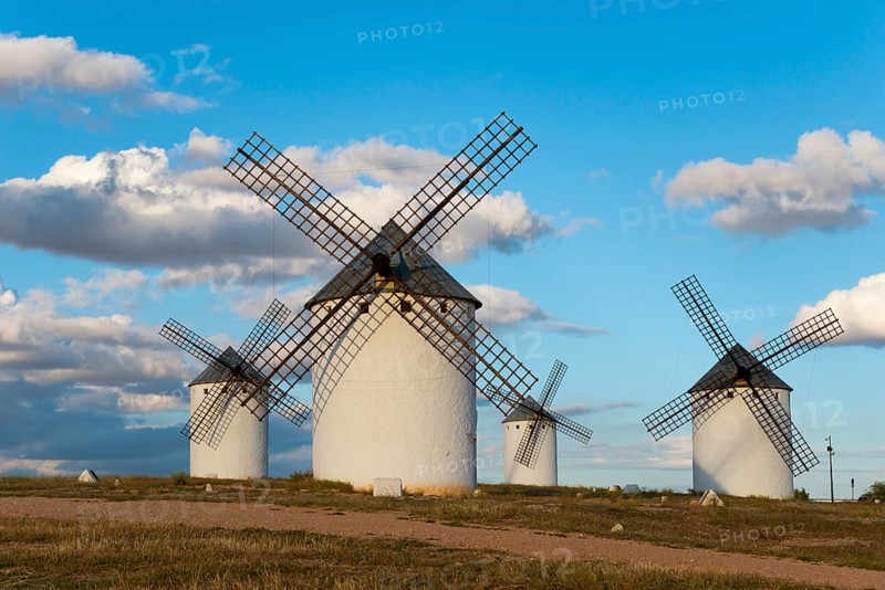Windmills in a vast and idyllic landscape under a blue sky with clouds, Windmills, Campo de Criptana, Ciudad Real province, Castilla-La Mancha, Route of Don Quixote, Spain, Europe