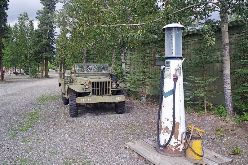 Old US Army jeep at an abandoned petrol pump, surrounded by forest, former army camp, Yukon, Discovery Lodge, Yukon Territory, Canada, North America