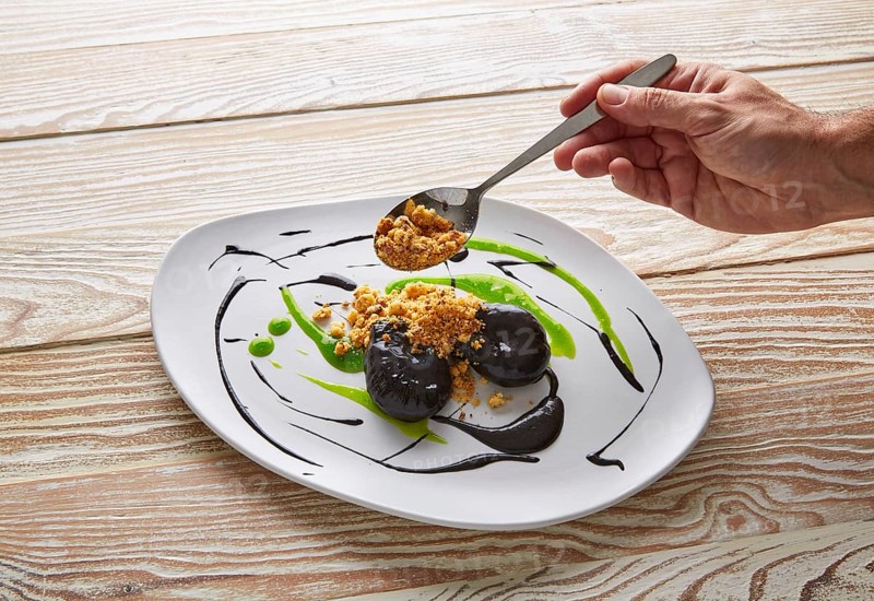 Molecular gastonomy cuttlefish roes with citrus mayonnaise