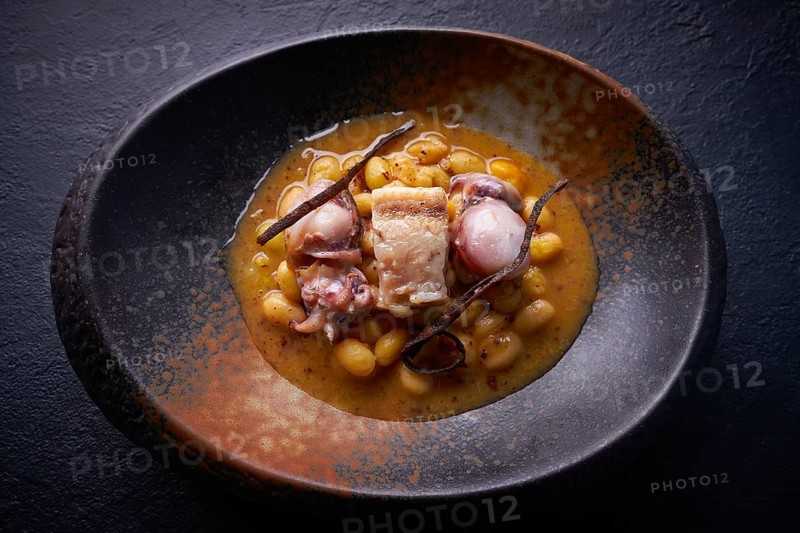 Judias pochas beans with calamari seafood and bacon