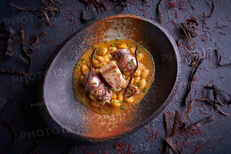 Judias pochas beans with calamari seafood and bacon