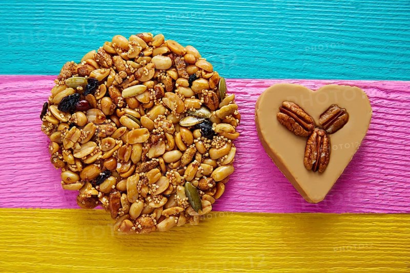 Mexican candy sweets Palanqueta with peanuts and cajeta heart with pecan nuts