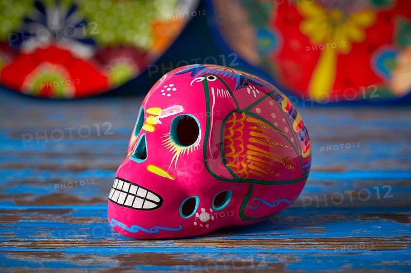 Mexican pink skull dia muertos crafts in Mexico of deaths day