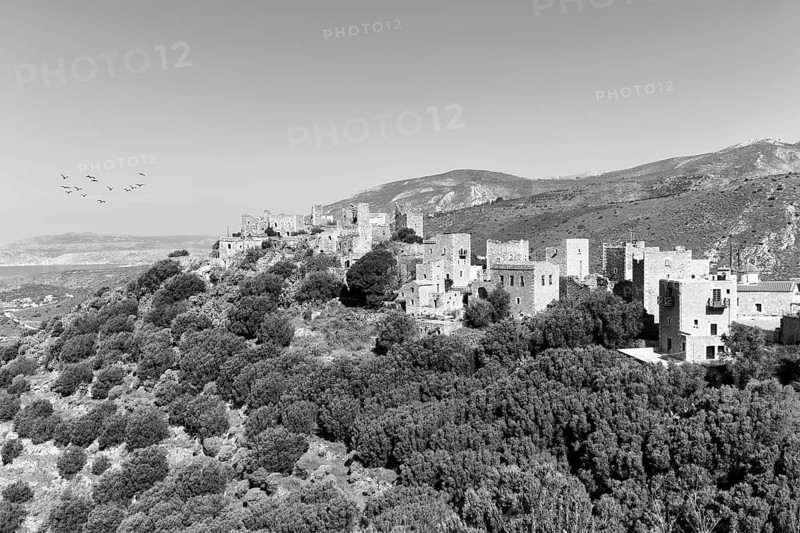 Picturesque residential towers with holiday flats and hotels, historic village of Vathia, view of the Messinian Gulf, monochrome, Mani, Greece, Europe
