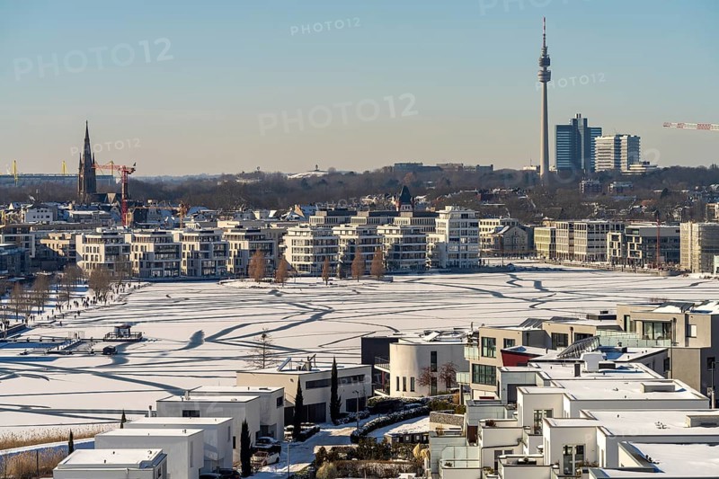 View of the snow-covered and frozen Phoenix Lake and the Florian television tower in Dortmund, North Rhine-Westphalia, Germany, Europe