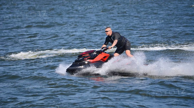 Man on jet ski, water scooter on Baltic Sea, Swinoujscie, Western Pomerania, Poland, Europe