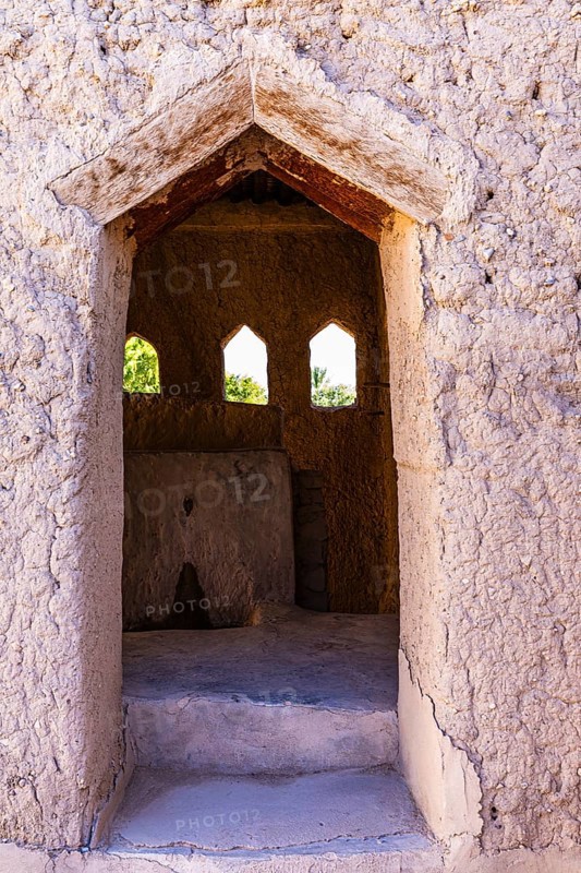 Open entrance to a small building with a view, in the largest preserved mud town in Oman, Al Bilaad, Al Bilaad Historical Village, Arabian Peninsula, Sultanate of Oman