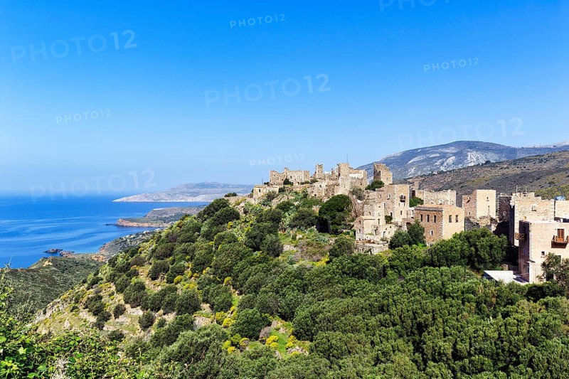 Picturesque residential towers with holiday flats and hotels, historic village of Vathia, view of the Messinian Gulf, blue sky, Mani, Greece, Europe