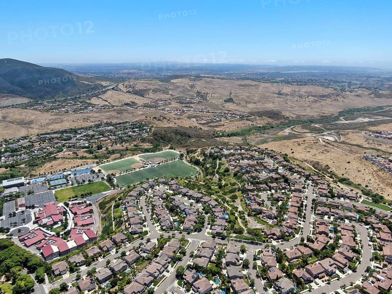 Aerial view of suburban neighborhood with big mansions in San Diego, California, USA. Aerial view of residential modern subdivision luxury house
